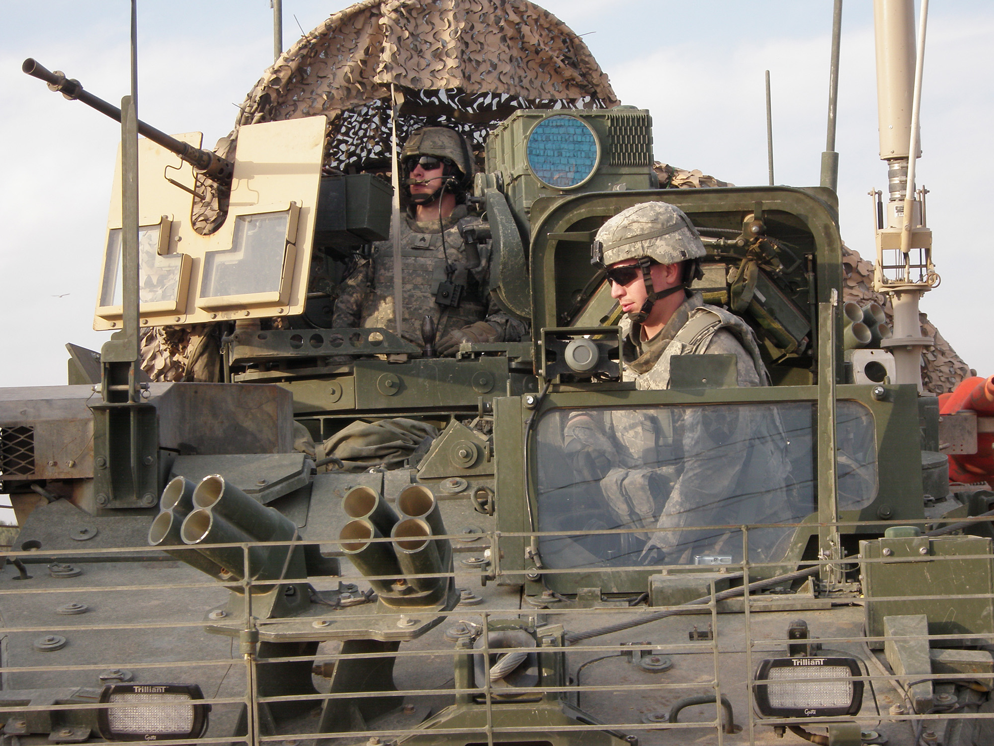 Patrick in the turret of a Stryker combat vehicle.